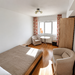 Titulescu, apartament cu balcon cat o camera, metrou la 2 minute.