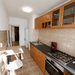 Titulescu, apartament cu balcon cat o camera, metrou la 2 minute.